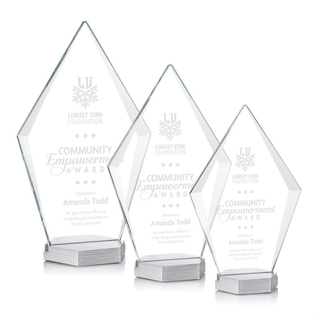Three glass awards for community empowerment presented to Amanda Todd by Lindsey Vonn Foundation.