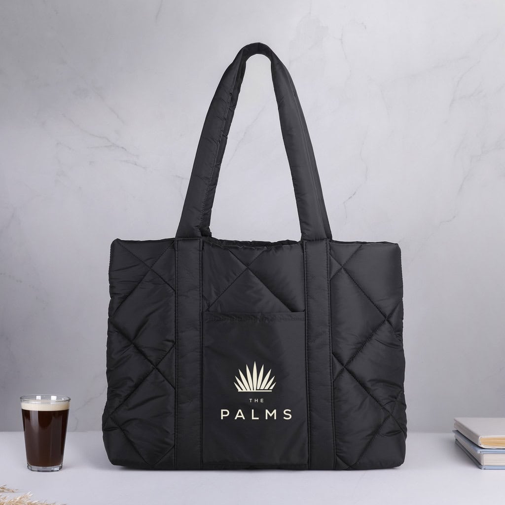Black quilted tote bag with logo and handles for promotional use.